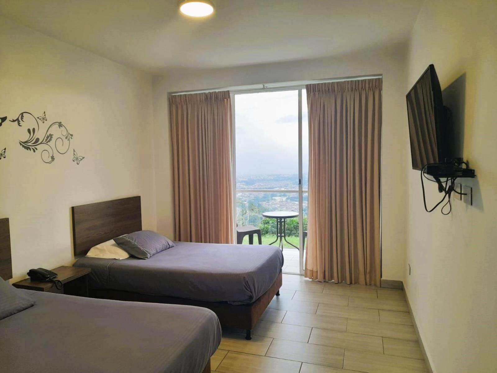 Hotel Entre Lomas Санта-Роса-де-Кабаль Екстер'єр фото